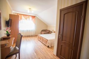Postel nebo postele na pokoji v ubytování Goldenluxe