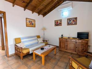 A television and/or entertainment centre at Masca - Casa Rural Morrocatana - Tenerife ONLY ADULTS
