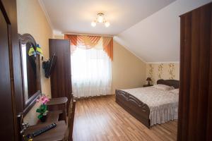 Postel nebo postele na pokoji v ubytování Goldenluxe