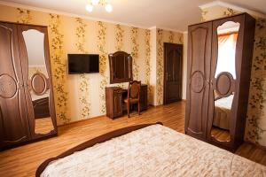 Postel nebo postele na pokoji v ubytování Goldenluxe