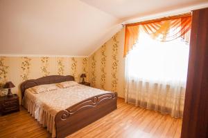 Postel nebo postele na pokoji v ubytování Goldenluxe