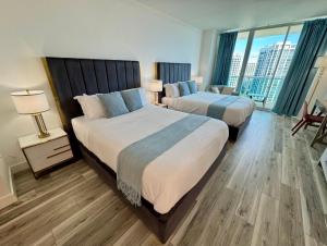 Voodi või voodid majutusasutuse Balcony Ocean View ! WiFi - Pool - Gym - Parking toas