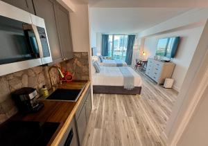 Voodi või voodid majutusasutuse Balcony Ocean View ! WiFi - Pool - Gym - Parking toas