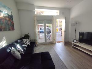 TV a/nebo společenská místnost v ubytování Apartamento HM en Vista Alegre Madrid