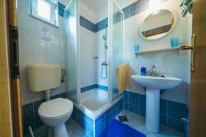 Kúpeľňa v ubytovaní Apartments Lovre