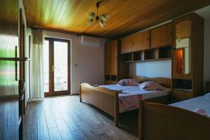 Posteľ alebo postele v izbe v ubytovaní Apartments Lovre
