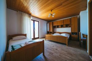 Posteľ alebo postele v izbe v ubytovaní Apartments Lovre