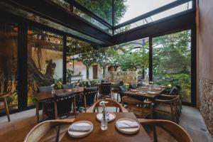 Un jardín fuera de Adoro Hotel Boutique