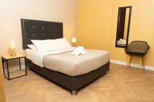 Cama ou camas em um quarto em Wild Rover Huacachina