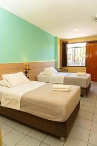 Cama ou camas em um quarto em Wild Rover Huacachina