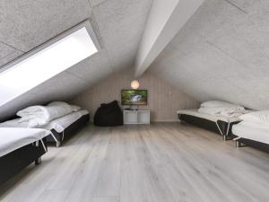Ένα ή περισσότερα κρεβάτια σε δωμάτιο στο 5 star holiday home in Idestrup +33 φωτογραφίες