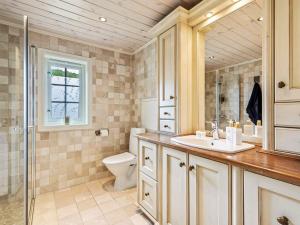a bathroom with a sink and a toilet at 9 person holiday home in Rauland in Rauland +45 photos