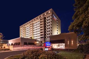 a hotel building with a sign in front of it at Fairfield Inn & Suites by Marriott Charlotte Uptown in Charlotte