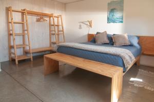 Postel nebo postele na pokoji v ubytování 7 Olas lodge