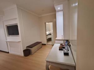 TV a/nebo společenská místnost v ubytování RC Hotel Melaka