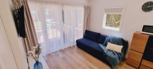 TV a/nebo společenská místnost v ubytování Cozy Private Ensuite Escape + 9 fotografií