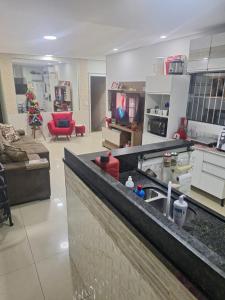 Χώρος καθιστικού στο Hostel BELLA ARAÚJO ALFA