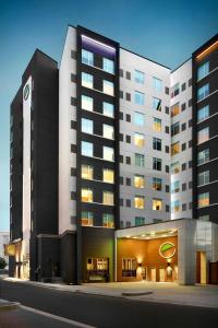 a rendering of a large building with a building at Element Charlotte Uptown in Charlotte