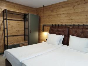 Postel nebo postele na pokoji v ubytování Iglika Hotel & Villas Borovets