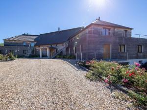 a house with a gravel driveway in front of it at Gîte en Sologne avec Activités & Vol en Montgolfière - FR-1-590-550 in Jouy-le-Potier