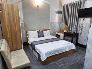 Postel nebo postele na pokoji v ubytování HOME Hotel