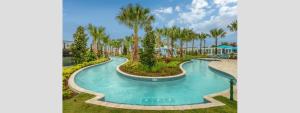 an image of a swimming pool at a resort at Modern 5BR TwnHome w Private Pool Near Disney 358 in Kissimmee