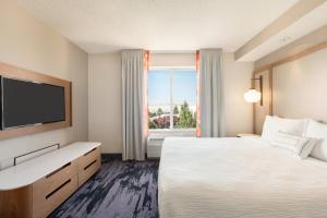 Postel nebo postele na pokoji v ubytování Fairfield Inn & Suites by Marriott Reno Sparks
