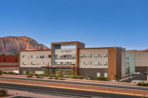 rappresentazione di un edificio con una montagna sullo sfondo di Element Sedona a Sedona