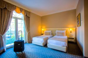 Кровать или кровати в номере Lot Boutique Hotel by Hotels and Preference