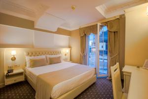 Кровать или кровати в номере Lot Boutique Hotel by Hotels and Preference