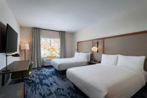 Ένα ή περισσότερα κρεβάτια σε δωμάτιο στο Fairfield by Marriott Inn & Suites Fort Worth Alliance Airport +16 φωτογραφίες