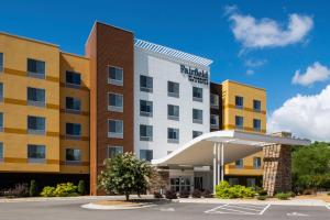 an exterior view of a hotel at Fairfield Inn & Suites Rocky Mount in Rocky Mount