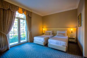 Кровать или кровати в номере Lot Boutique Hotel by Hotels and Preference
