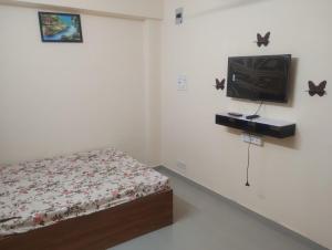 Televisyen dan/atau pusat hiburan di Hotel Metro Althan +14 gambar