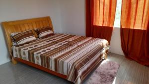 Ένα ή περισσότερα κρεβάτια σε δωμάτιο στο Cozy Appartment +15 φωτογραφίες