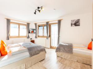 Posteľ alebo postele v izbe v ubytovaní Chalet in Zillertal near Ski Slopes