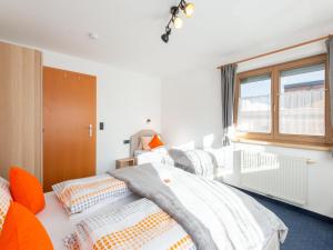 Posteľ alebo postele v izbe v ubytovaní Chalet in Zillertal near Ski Slopes