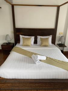 Voodi või voodid majutusasutuse Suite Home Boutique Hotel toas