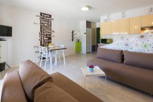 Χώρος καθιστικού στο Apartments & Rooms Laganini SARA