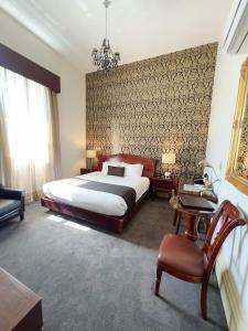 Postel nebo postele na pokoji v ubytování Quality Inn Heritage on Lydiard