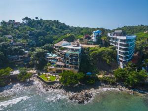 an aerial view of a resort on a cliff at Casa Hafiz in Sayulita