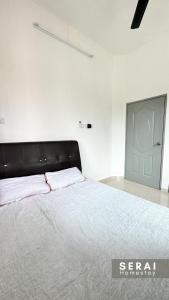 Postelja oz. postelje v sobi nastanitve SERAI Homestay