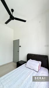 Postelja oz. postelje v sobi nastanitve SERAI Homestay