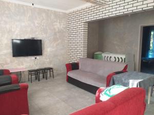 TV a/nebo společenská místnost v ubytování Family Hotel Andria