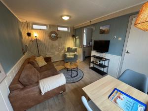 Χώρος καθιστικού στο Charmant Vakantiehuis in Egmond op loopafstand Strand & Centrum
