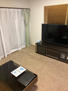 TV a/nebo společenská místnost v ubytování Private Lodging KASE 五所川原