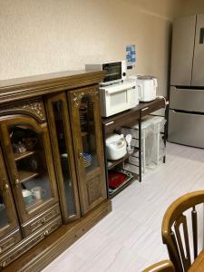 Kuchyň nebo kuchyňský kout v ubytování Private Lodging KASE 五所川原