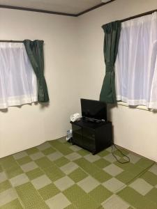 TV a/nebo společenská místnost v ubytování Private Lodging KASE 五所川原