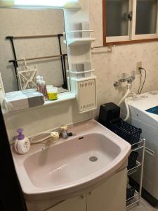 Koupelna v ubytování Private Lodging KASE 五所川原