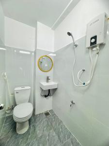 Koupelna v ubytování Nhà Nghỉ M91